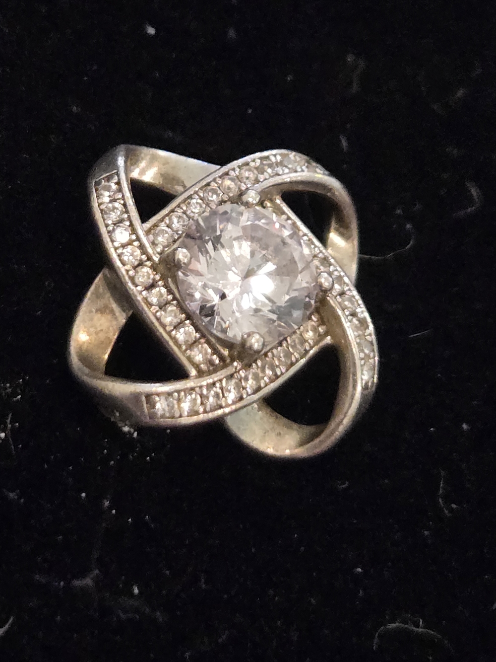 Sterling Silver Twist Halo Ring with Clear Center Stone